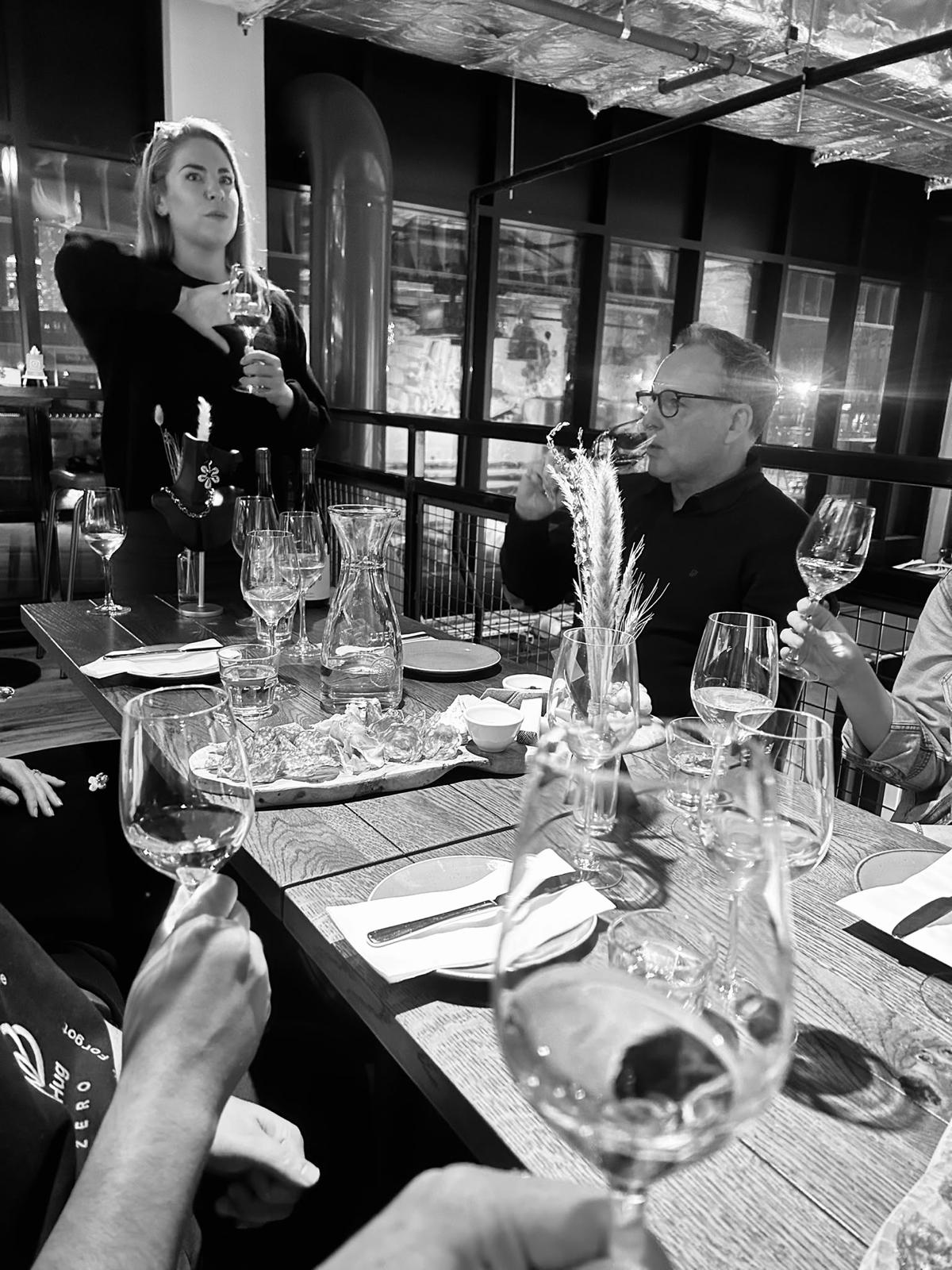A toast across the table at the Supper Club